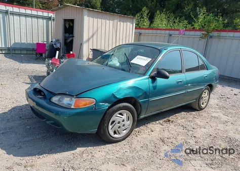 1997 Ford Escort Lx z USA, uszkodzony, nr VIN 1FALP13P4VW258961